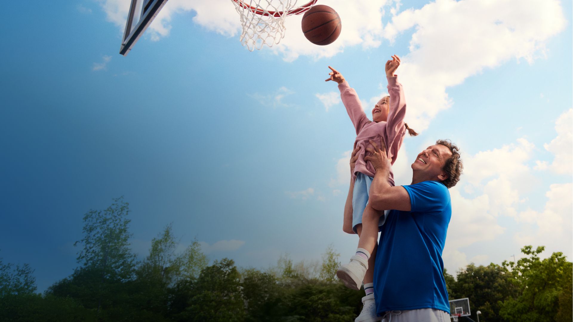 Actor portrayal of a Camzyos® (mavacamten) patient and a young girl playing basketball.