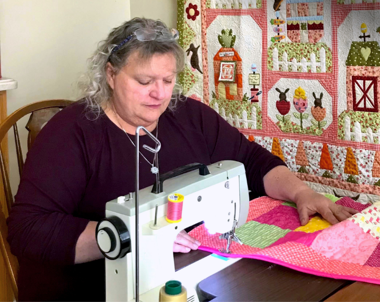 Connie, a Rx CAMZYOS® (mavacamten) patient, sewing