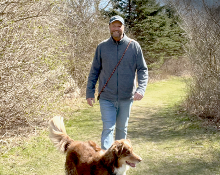 John, a Rx CAMZYOS® (mavacamten) patient with his dog